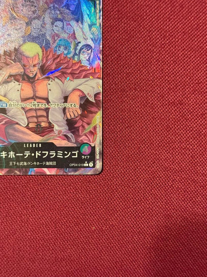 One Piece Donquixote Doflamingo OP04-019 trading card from Japan with minor signs of use in protective sleeve