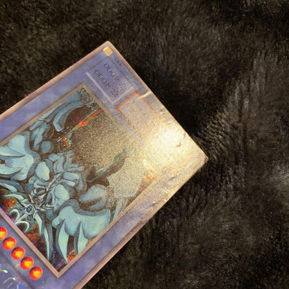 Yugioh OCG Obelisk the Tormentor collectible card with visible Signs of surface wear and edge chips