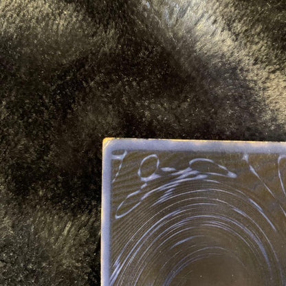 Yugioh OCG Obelisk the Tormentor collectible card with visible Signs of surface wear and edge chips