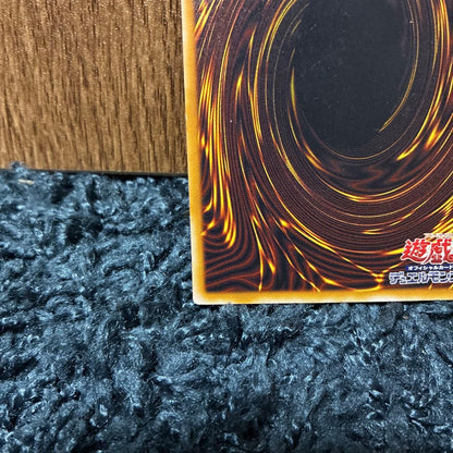 Bandai Blue-Eyes White Dragon Ultra Relief with visible dents, tears, and original protective packaging