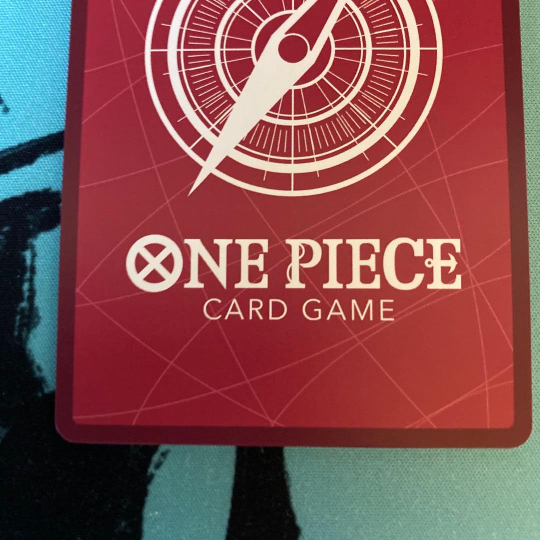 One Piece Portgas D Ace Leader Parallel Card OP-16 in red from Kessen no Toki series placed in a protective sleeve