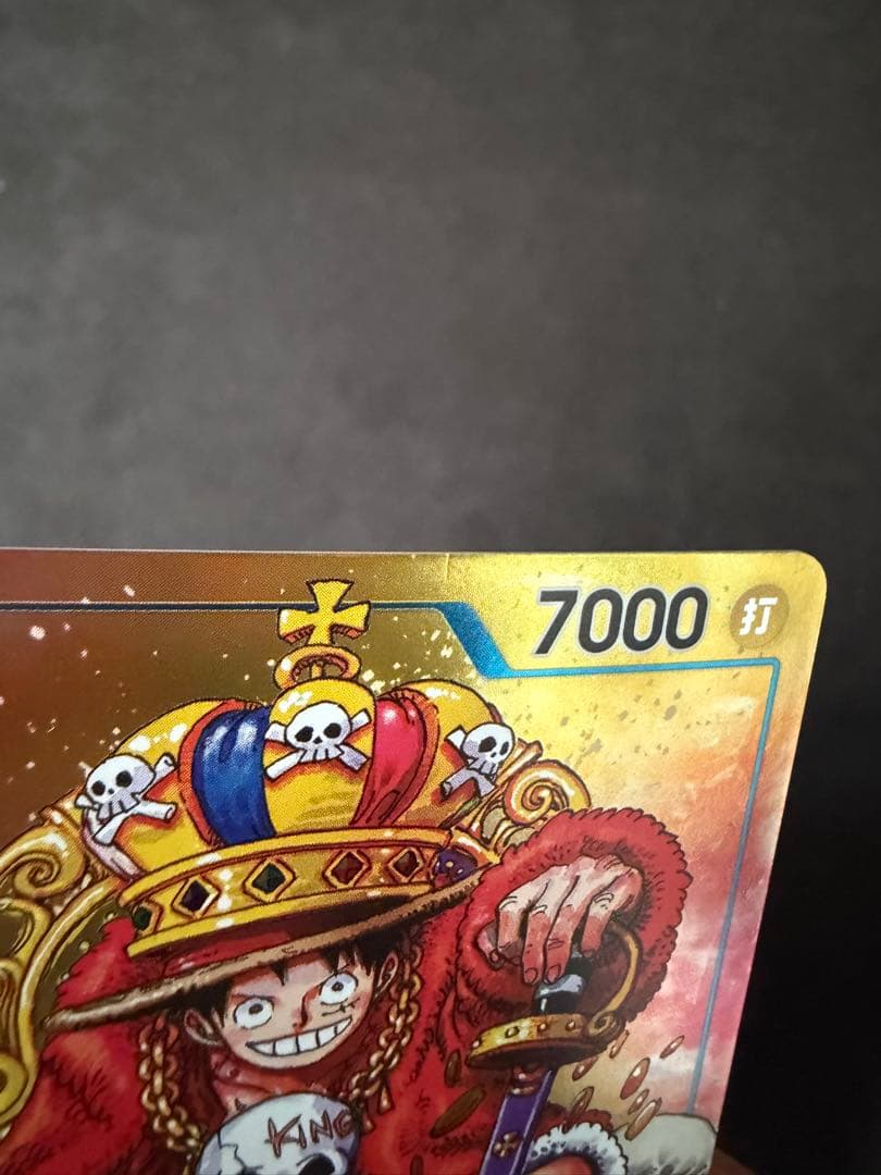 One Piece Monkey D. Luffy P-043 card game with visible vertical scratch marks on surface