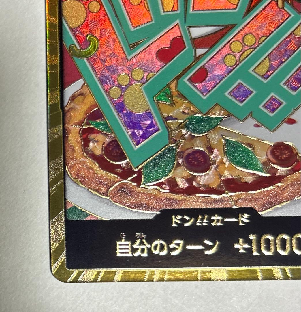One Piece Don Card Gold Don Jewelry featuring Bonnie Pizza with included sleeves and loader for storage