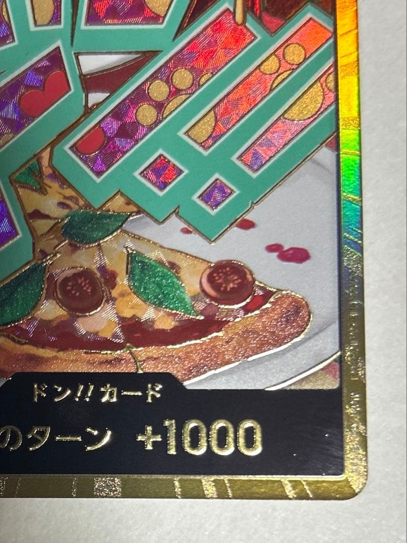 One Piece Don Card Gold Don Jewelry featuring Bonnie Pizza with included sleeves and loader for storage