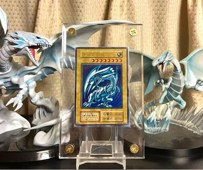 Yu-Gi-Oh Blue-Eyes White Dragon Initial Ultra Rare card in screw-down case with metallic border and slight scratches