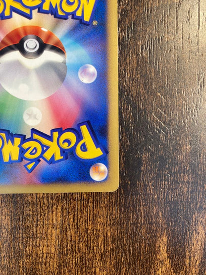 Pokemon Lugia card from Shining Darkness expansion pack in mint condition stored in protective sleeve