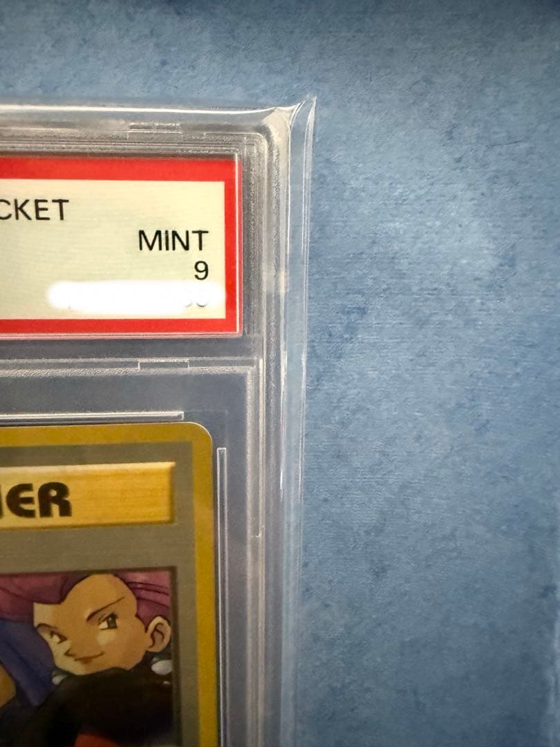 Bandai Rocket-dan Pokémon card with PSA 9 grade and old back design in protective case