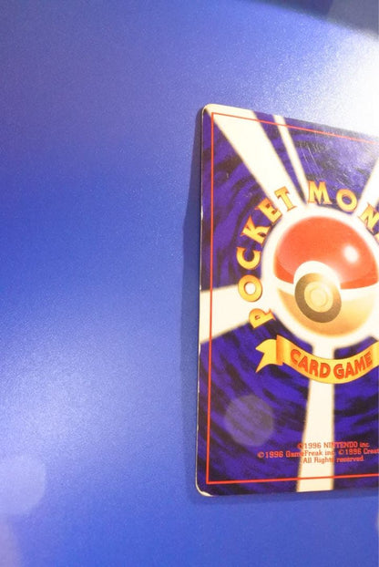 Vintage Japanese Pokemon Card Charizard LV 76 No 006 Energy Burn with visible wear and white spots