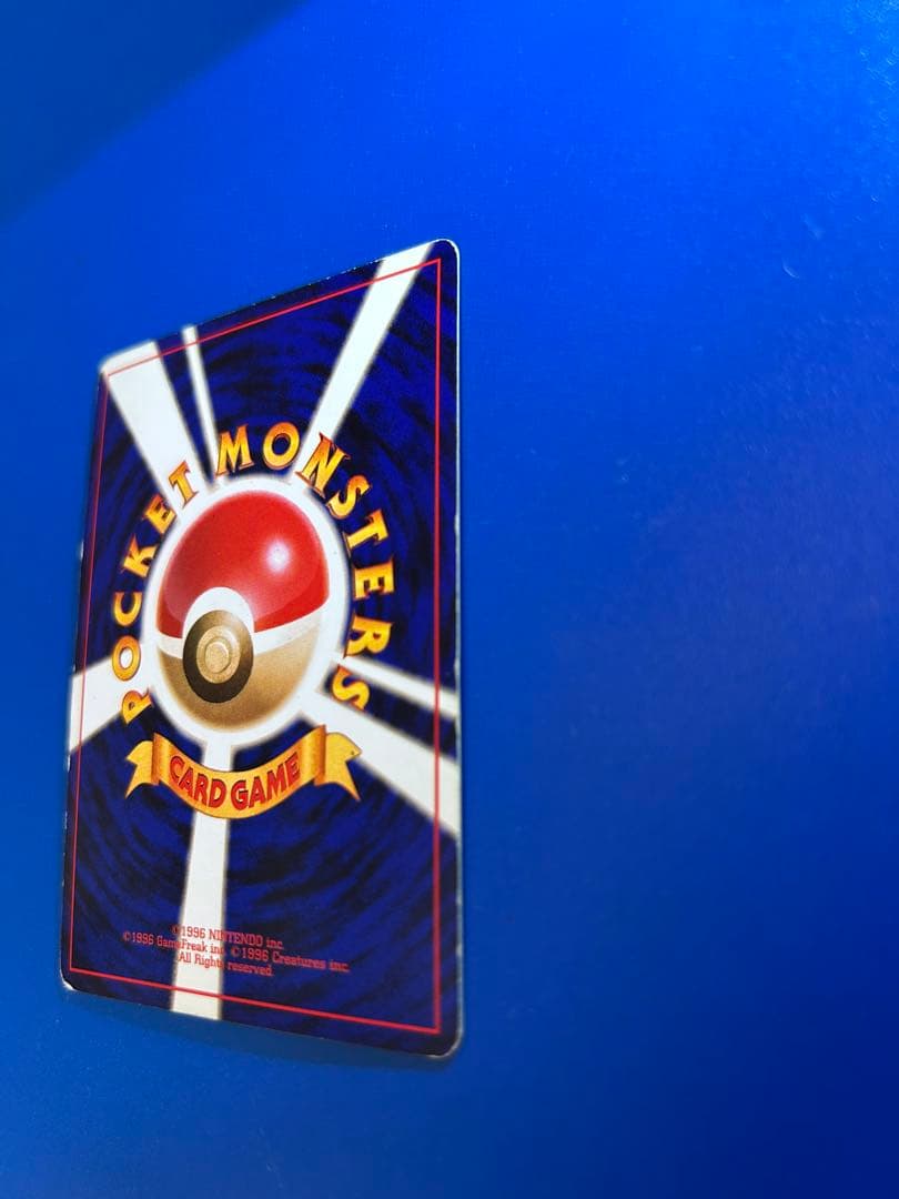 Vintage Japanese Pokemon Card Charizard LV 76 No 006 Energy Burn with visible wear and white spots