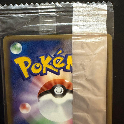 Unopened Bandai Pokemon Charizard Meiji Choco Snack promotional trading card in Japanese