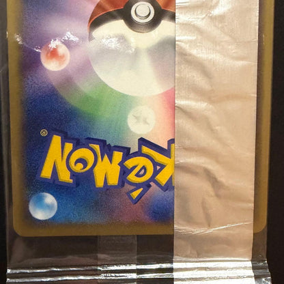 Unopened Bandai Pokemon Charizard Meiji Choco Snack promotional trading card in Japanese