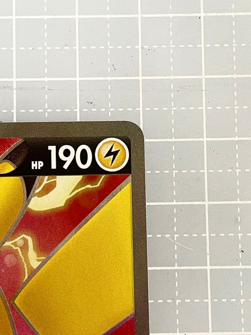 Bandai Pikachu V SR Overwhelming Volt Tackle 104/100 trading card with slight wear packed in protective sleeve and loader