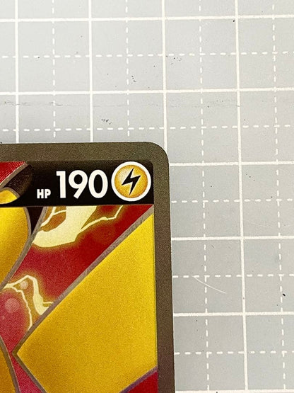 Bandai Pikachu V SR Overwhelming Volt Tackle 104/100 trading card with slight wear packed in protective sleeve and loader