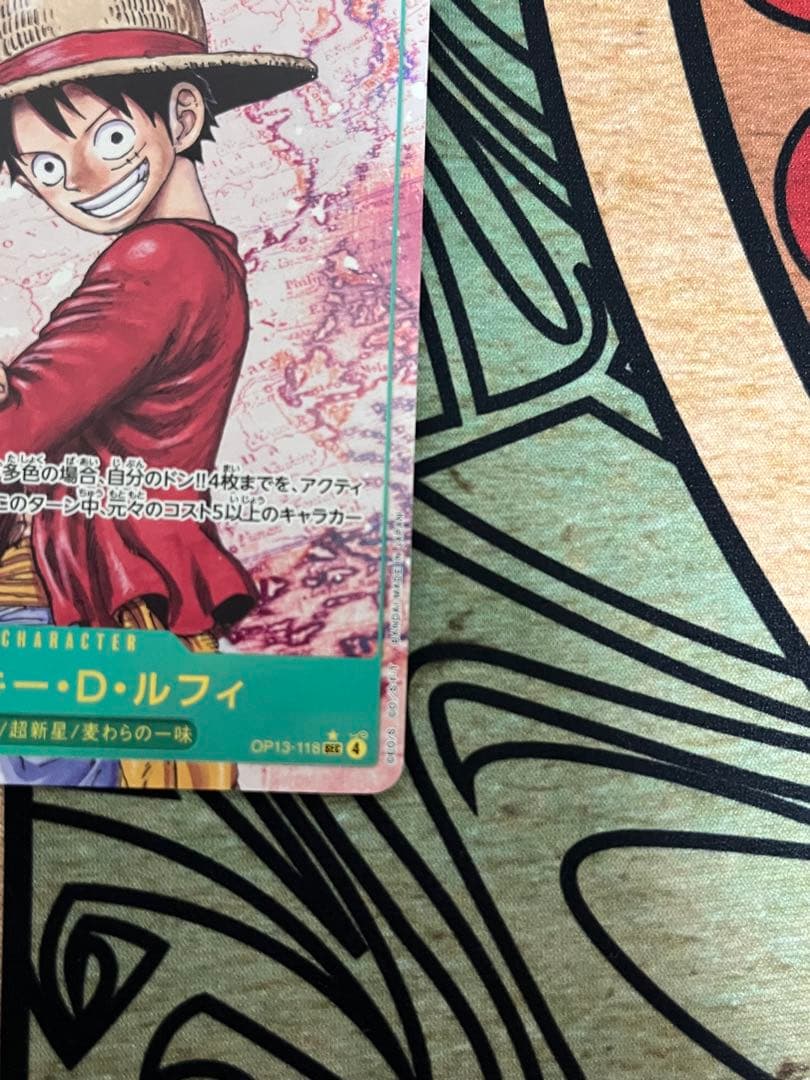 One Piece Monkey D. Luffy SEC Parallel OP13-118 trading card Japan import featuring colorful anime art