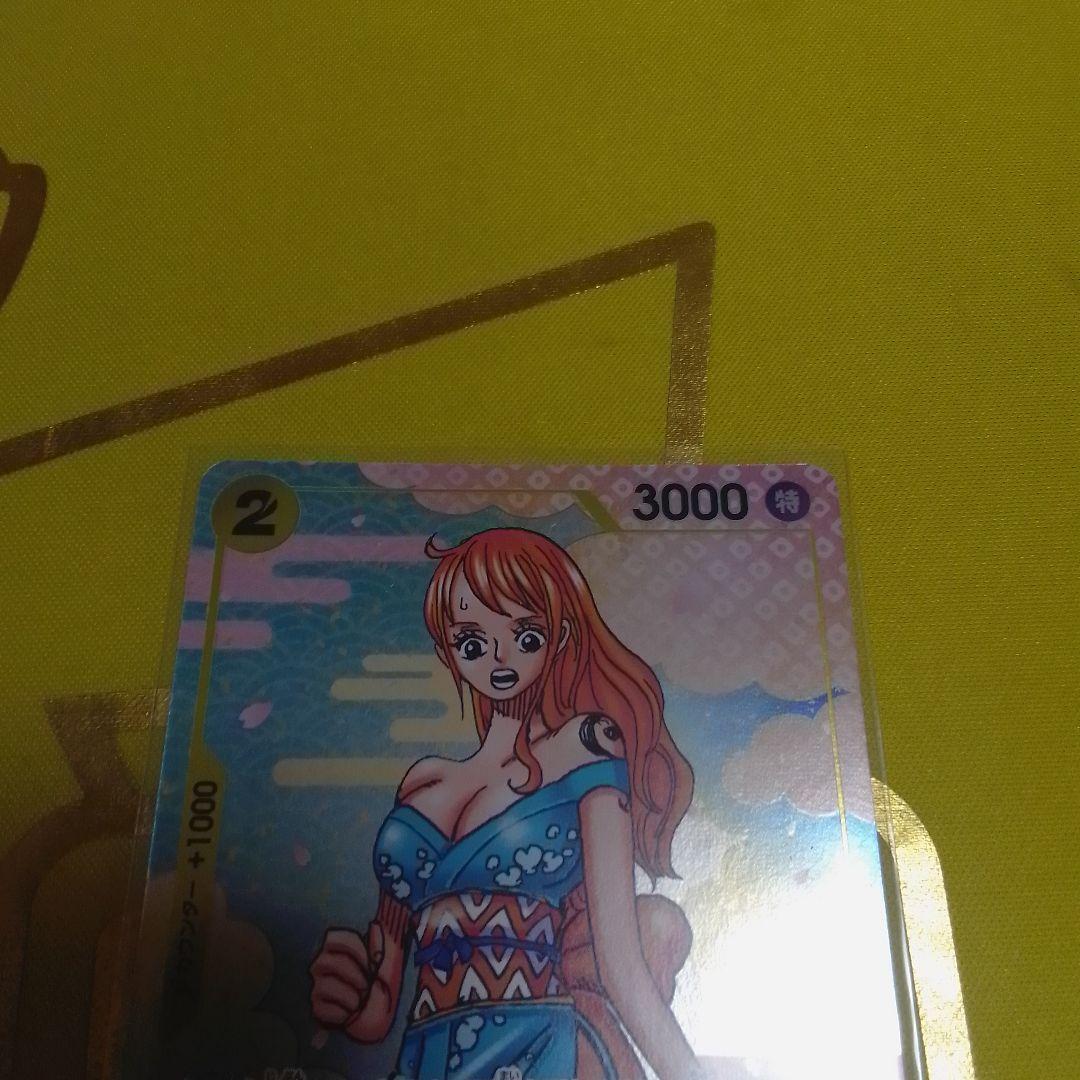 One Piece Card Game Nami R OP06-101 promotional card from Japan in protective sleeve