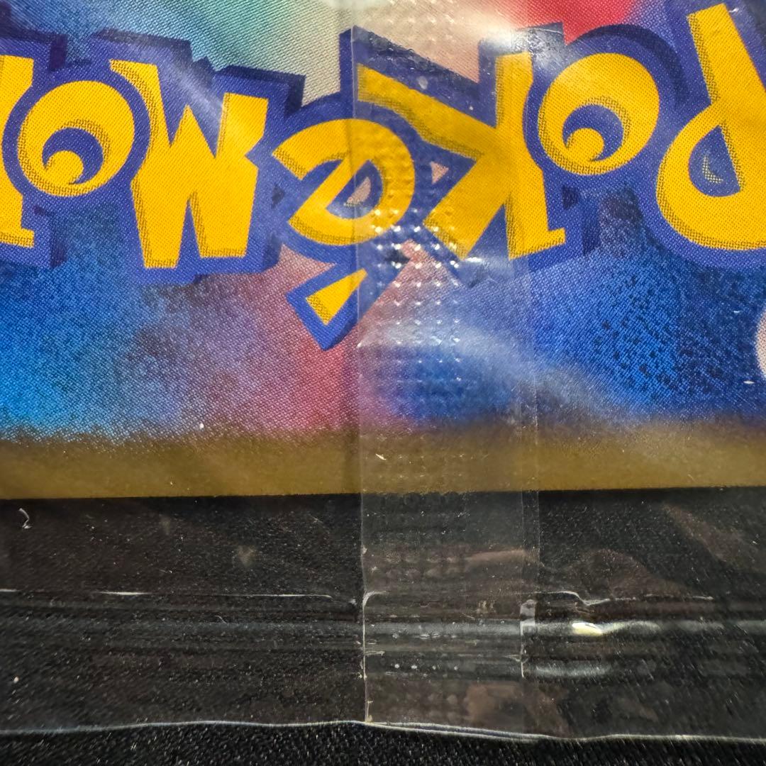Unopened Pokemon Card Player's Promo from Japan in original packaging with minor outer bag damage