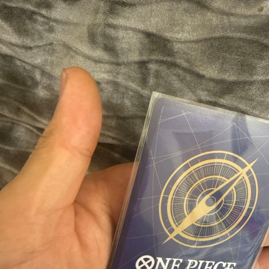 One Piece Card Game Nami Parallel OPS14-031 green character card with Film attribute and blocker ability