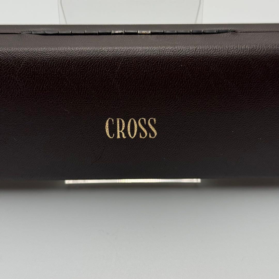 Brown CROSS pen case empty box with gold logo, measuring approximately 6.5 inches by 2.2 inches