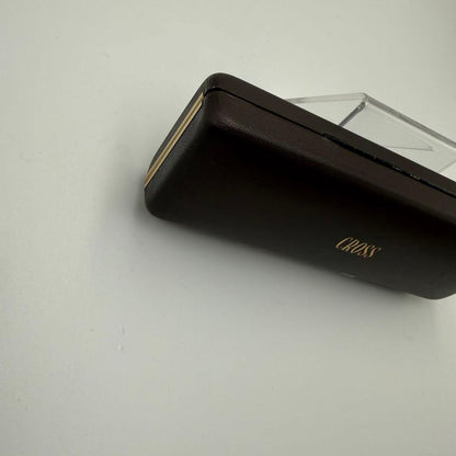 Brown CROSS pen case empty box with gold logo, measuring approximately 6.5 inches by 2.2 inches