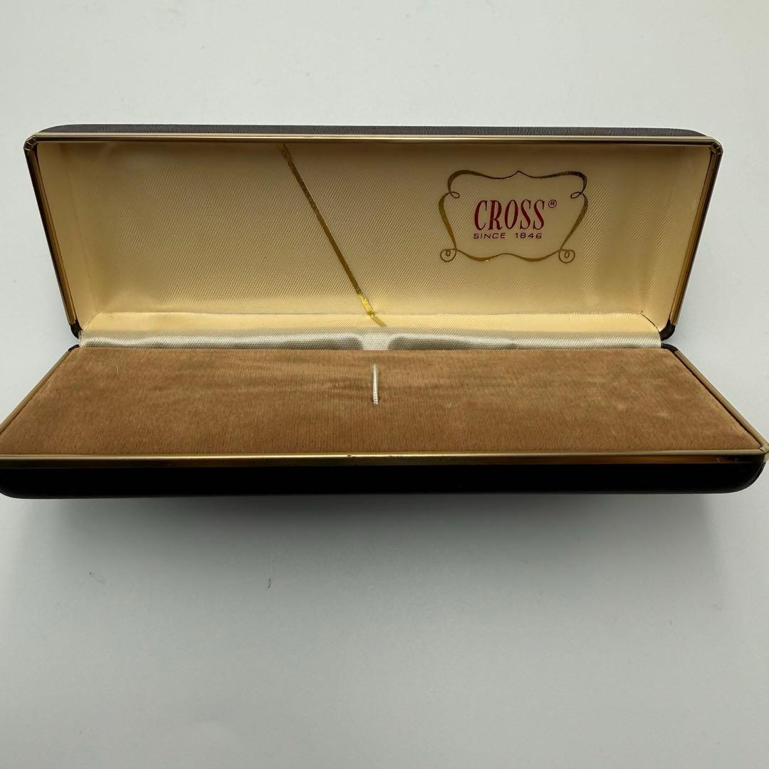 Brown CROSS pen case empty box with gold logo, measuring approximately 6.5 inches by 2.2 inches