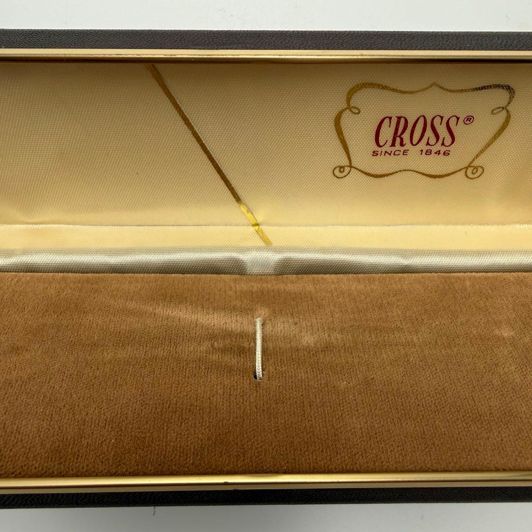 Brown CROSS pen case empty box with gold logo, measuring approximately 6.5 inches by 2.2 inches