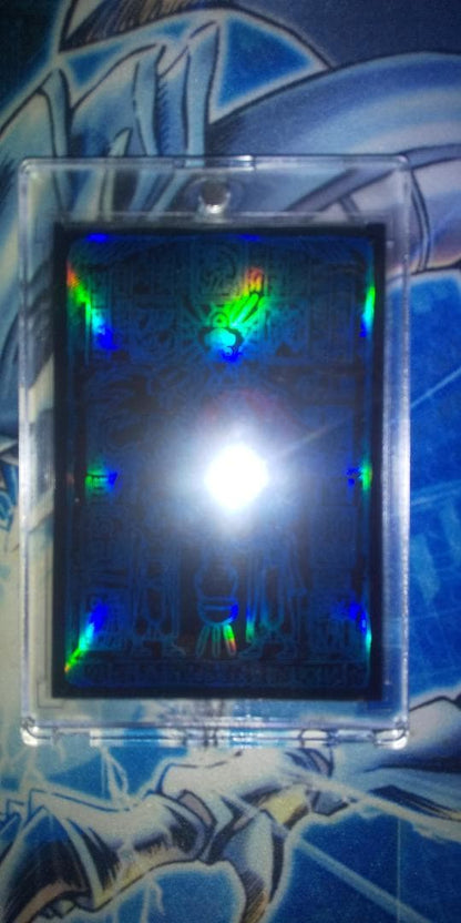 Bandai Blue-Eyes White Dragon stainless steel card holder with unopened loader showing Ultra Rare monster card