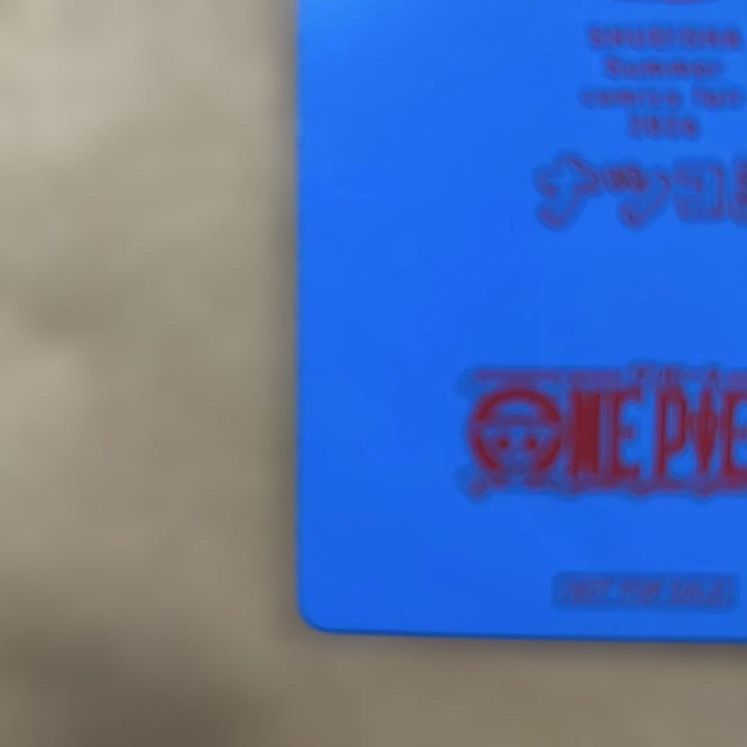 Oda Eiichiro signed One Piece Natsumi 2026 Metakira trading card in protective hard loader from Japan