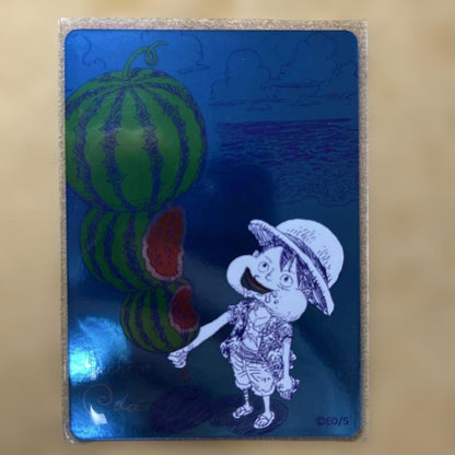 Oda Eiichiro signed One Piece Natsumi 2026 Metakira trading card in protective hard loader from Japan
