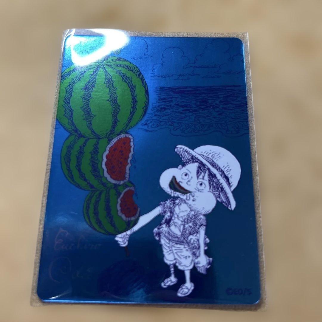 Oda Eiichiro signed One Piece Natsumi 2026 Metakira trading card in protective hard loader from Japan