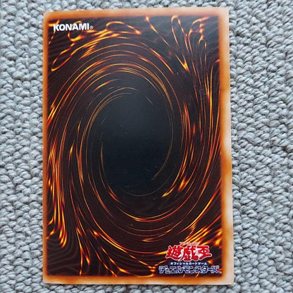Bandai Yu-Gi-Oh Blue-Eyes White Dragon Ultra Rare Monster Card showing small scratches and frame misalignment