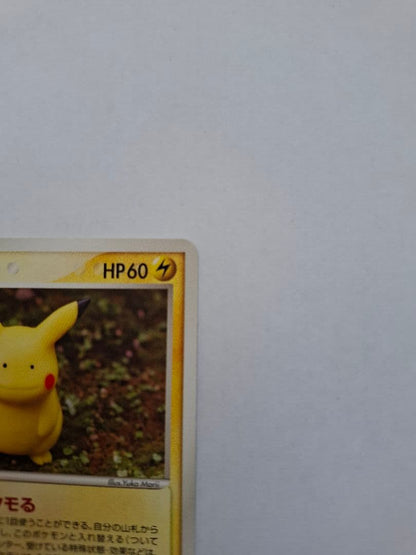 Bandai Metamon Pikachu Horon Research Tower 1st Edition collectible card 033/086 with white paint scratches