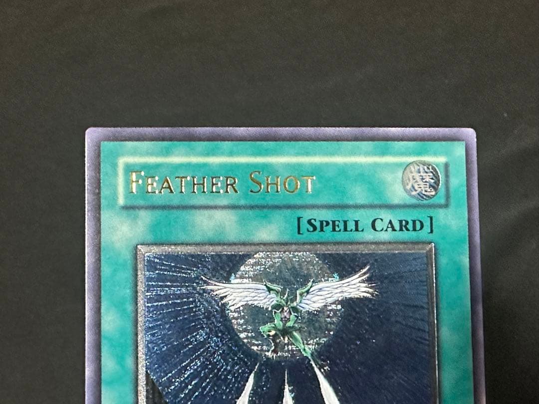 Feather Shot Asia Relief Card old Asia version in good condition with no scratches or chips