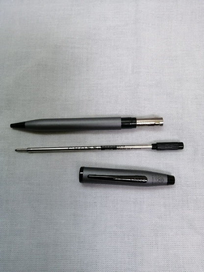 Cross Century II ballpoint pen in gunmetal gray brass with black ink twist mechanism