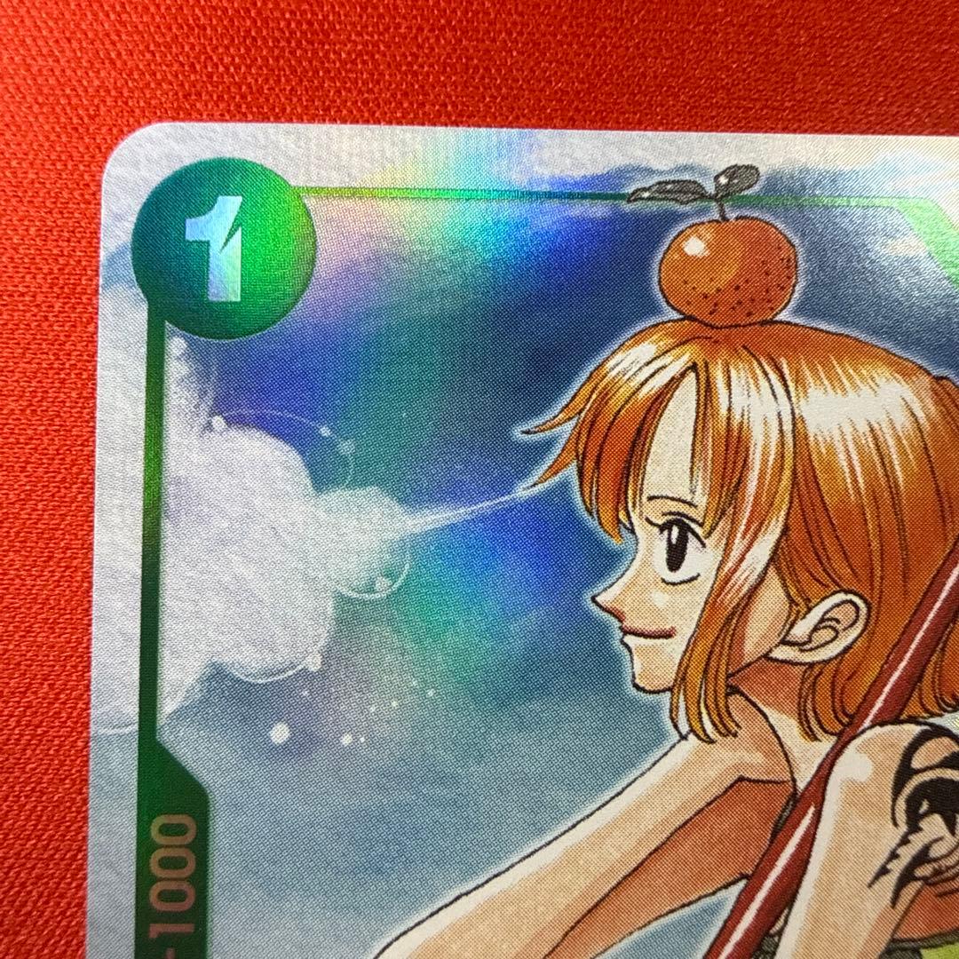 One Piece Card Game card featuring Nami EB02-017 Japanese import with good centering and condition