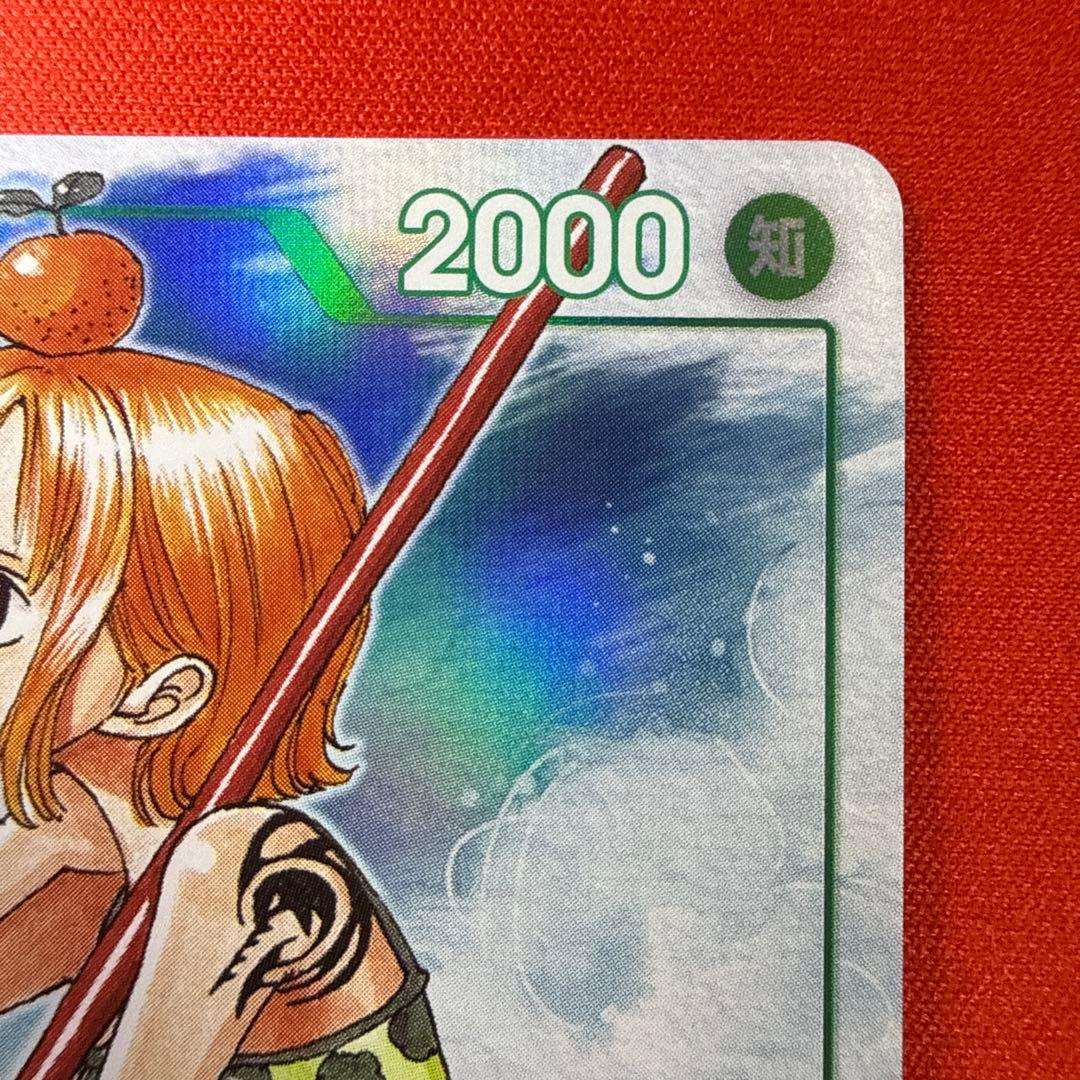 One Piece Card Game card featuring Nami EB02-017 Japanese import with good centering and condition