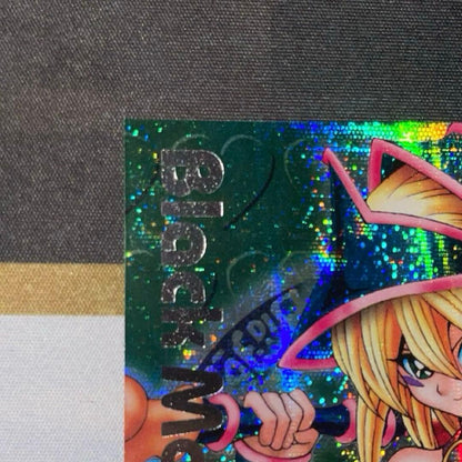 Yugioh Dungeon Dice Monsters Dark Magician Girl card green background secret rare silver text in magnetic loader
