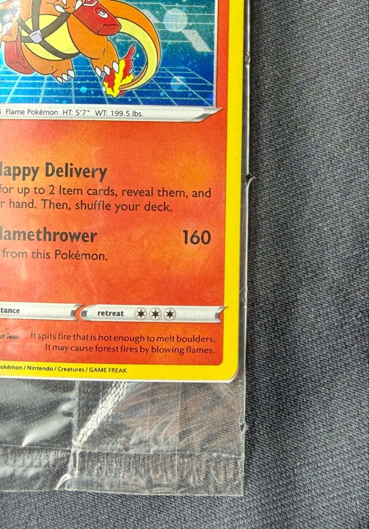 Unopened Pokemon special delivery Charizard promo card SWSH075 sealed in original shield pack from Japan