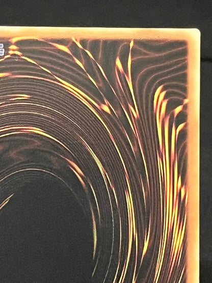Magic Discoveries 25th Quasic Asia Edition Yu-Gi-Oh Black Magician trading card with visible back marks