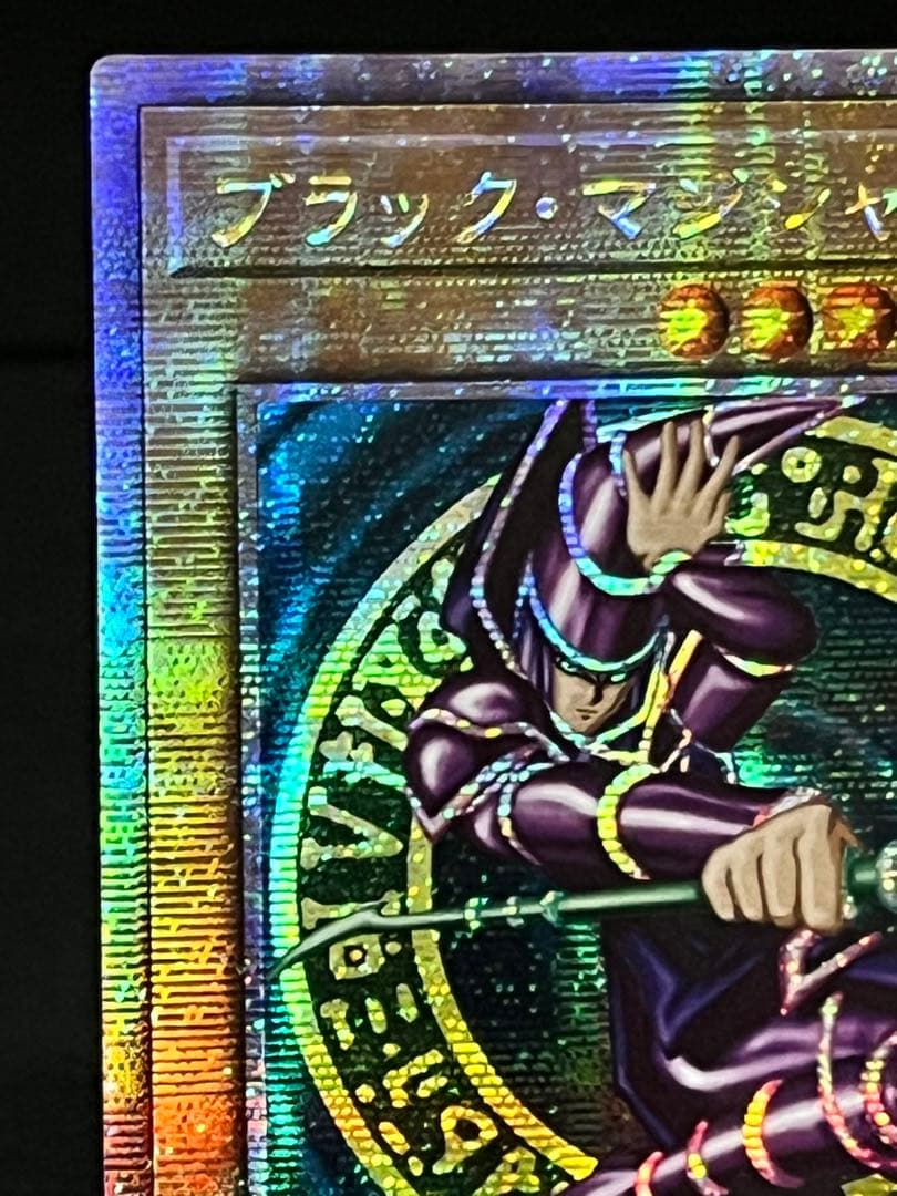 Magic Discoveries 25th Quasic Asia Edition Yu-Gi-Oh Black Magician trading card with visible back marks