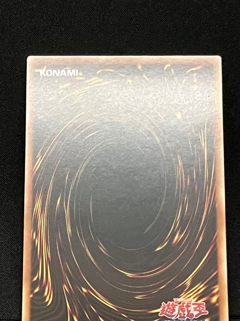 Magic Discoveries 25th Quasic Asia Edition Yu-Gi-Oh Black Magician trading card with visible back marks