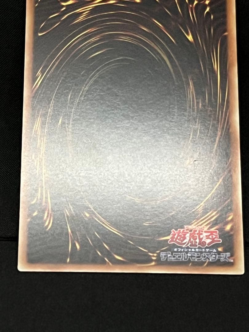Magic Discoveries 25th Quasic Asia Edition Yu-Gi-Oh Black Magician trading card with visible back marks