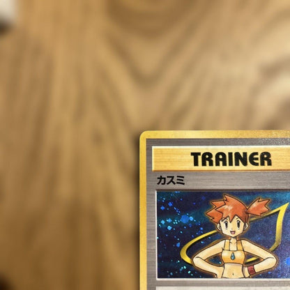 Casio Old-Back Japanese Pokémon card showing full holo front and vintage design