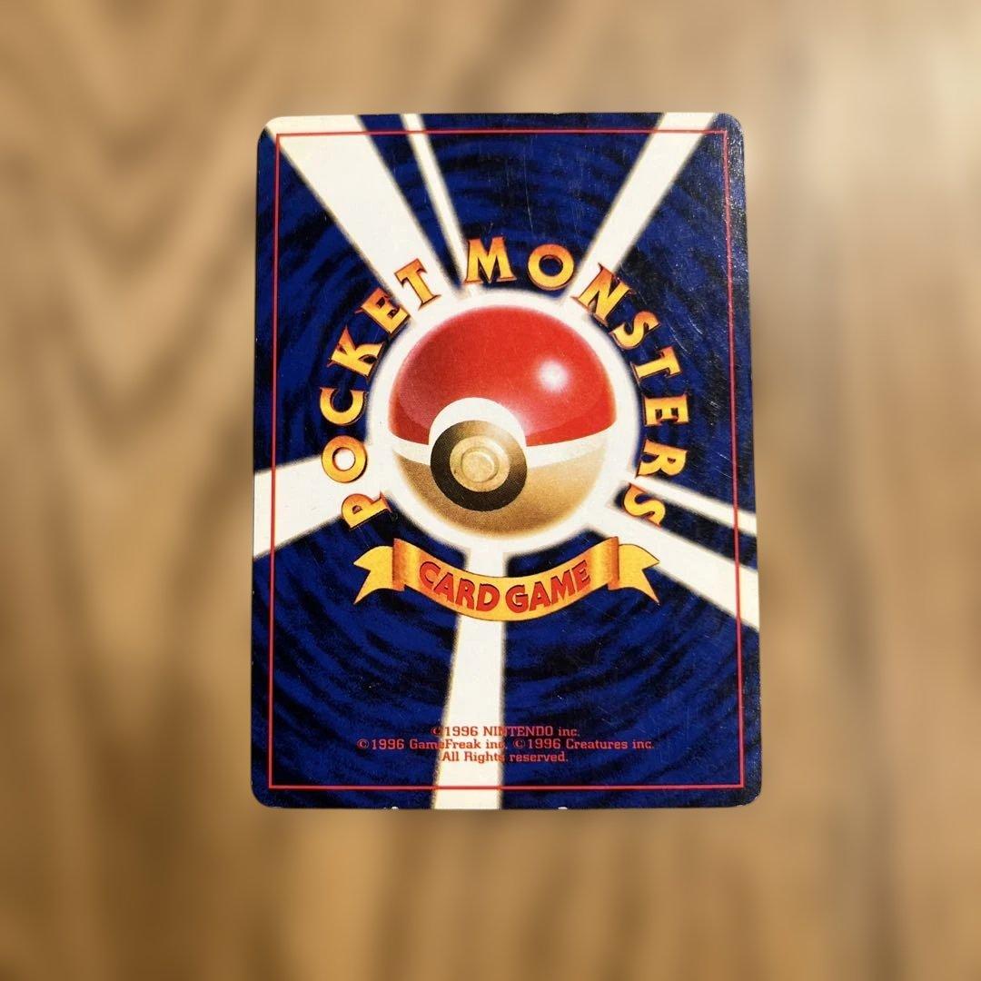 Casio Old-Back Japanese Pokémon card showing full holo front and vintage design