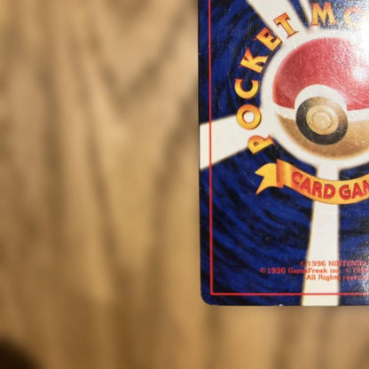 Casio Old-Back Japanese Pokémon card showing full holo front and vintage design