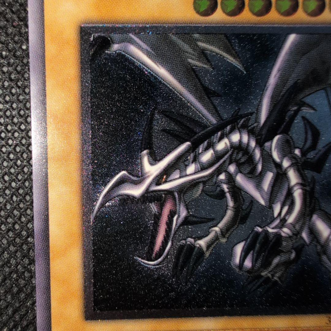 Yu-Gi-Oh! Crimson Eyes Black Dragon card 301-056 with old relief rarity from Japan