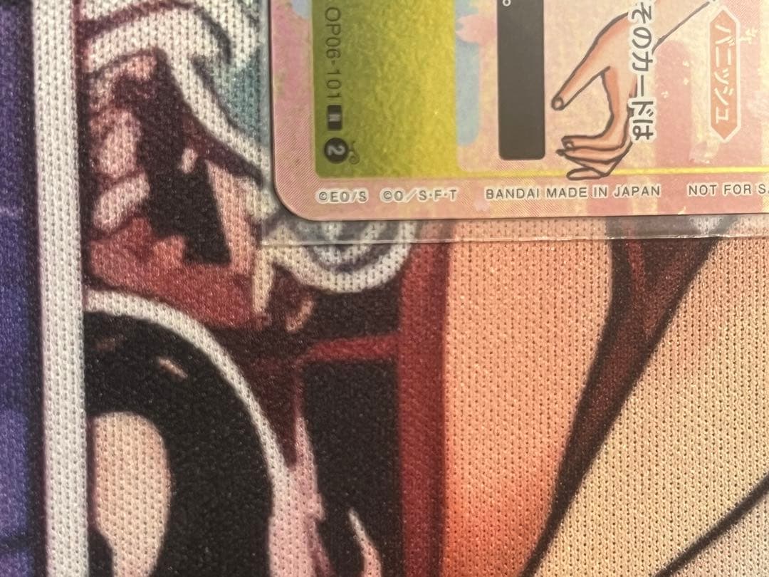 One Piece Card Game Nami OP06-101 promo card from Japan shown with detailed artwork