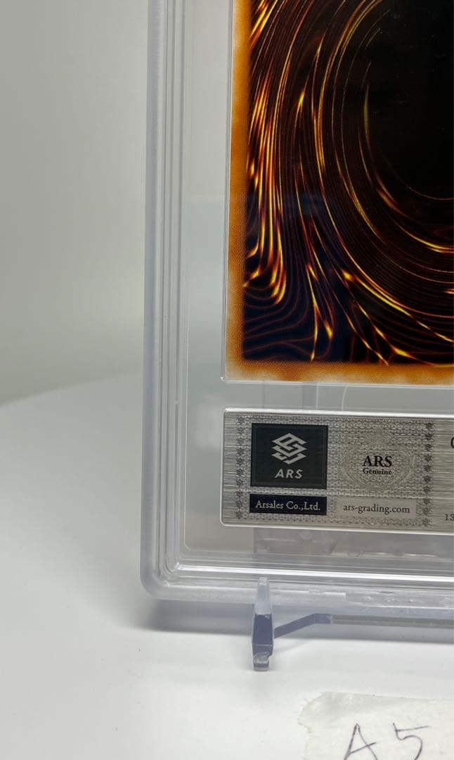 Yugioh Black Magician Girl Ultra Rare P4-01 trading card in protective sleeve with cardboard backing