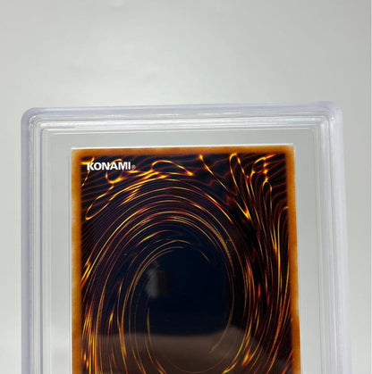 Yugioh Black Magician Girl Ultra Rare P4-01 trading card in protective sleeve with cardboard backing