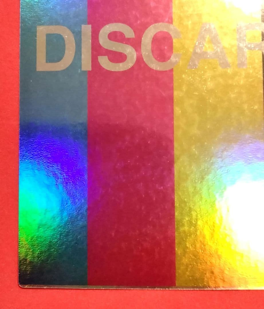 Japanese test print Holorama card error with colorful glitter, hologram elements, and discard display in used condition