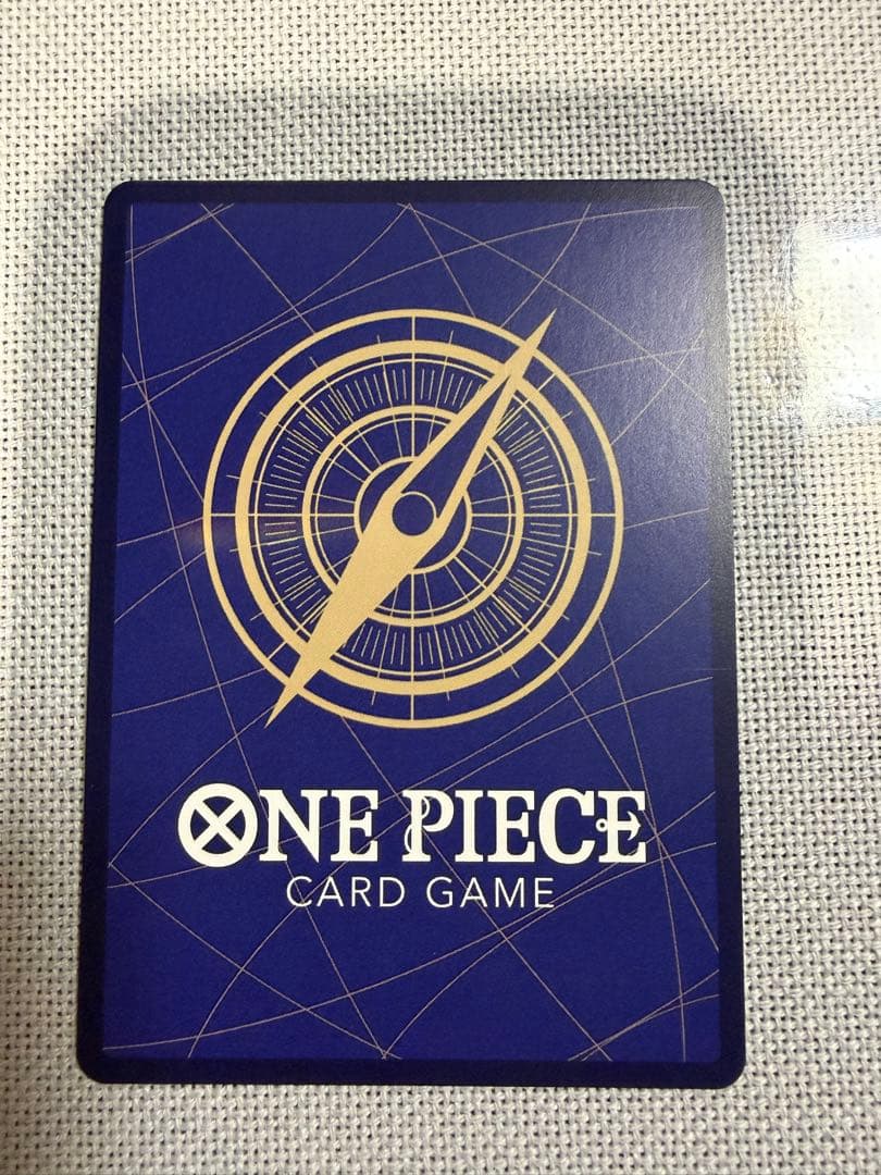 One Piece Card Game 13-card set featuring Monkey D. Luffy SEC and SR cards in protective sleeves